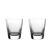 Handmade with a lovely optic finish, William Yeoward's Corinne Double Old Fashioned Tumblers evoke the style and glamour of the 1920s and 1930s when the new experience of cocktails and jazz was all the rage. Handmade with a lovely optic finish, William Yeoward's Corinne Double Old Fashioned Tumblers evoke the style and glamour of the 1920s and 1930s when the new experience of cocktails and jazz was all the rage.