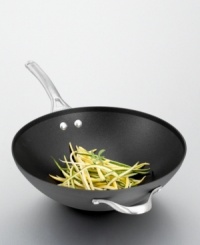 Stir things up with this versatile 12 nonstick flat-bottom wok. Part of the Contemporary Nonstick Collection, it has a unique vessel shape and hard-anodized aluminum construction. Intelligent features like a capacity indicator line on the rim and an ergonomic handle that stays cool during stovetop cooking will make it a new staple in your kitchen. Lifetime warranty. Stir things up with this versatile 12 nonstick flat-bottom wok. Part of the Contemporary Nonstick Collection, it has a unique vessel shape and hard-anodized aluminum construction. Intelligent features like a capacity indicator line on the rim and an ergonomic handle that stays cool during stovetop cooking will make it a new staple in your kitchen. Lifetime warranty.