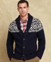 A classic pattern on this timeless shawl-collar cardigan from Tommy Hilfiger makes it a must-have for the season.