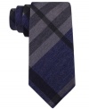 Polished plaid adds sophistication to this Kenneth Cole Reaction statement piece.