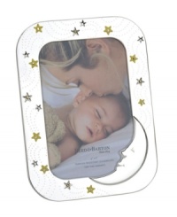 Moms and dads will be over the moon for Reed & Barton's Sweet Dreams picture frame. A silver-plated finish and twinkling stars in yellow enamel cradle baby pictures in sparkling splendor. Moms and dads will be over the moon for Reed & Barton's Sweet Dreams picture frame. A silver-plated finish and twinkling stars in yellow enamel cradle baby pictures in sparkling splendor.