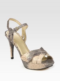 Textured Italian leather in a posh snake print with an adjustable ankle strap and a covered platform. Self-covered heel, 4 (100mm)Covered platform, 1 (25mm)Compares to a 3 heel (75mm)Snake-print leather upperLeather lining and solePadded insoleMade in SpainOUR FIT MODEL RECOMMENDS ordering true whole size; ½ sizes should order the next whole size down. Textured Italian leather in a posh snake print with an adjustable ankle strap and a covered platform. Self-covered heel, 4 (100mm)Covered platform, 1 (25mm)Compares to a 3 heel (75mm)Snake-print leather upperLeather lining and solePadded insoleMade in SpainOUR FIT MODEL RECOMMENDS ordering true whole size; ½ sizes should order the next whole size down.