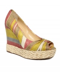 A touch of retro gold, these Goldie wedges from Report bring hippie-chic with espadrille detail and a colorful fabric finish. Pair with a floral sundress for instant style. A touch of retro gold, these Goldie wedges from Report bring hippie-chic with espadrille detail and a colorful fabric finish. Pair with a floral sundress for instant style.
