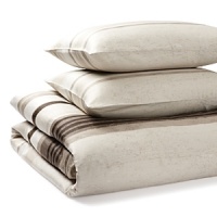 Luxurious combed cotton rendered in a weathered, hand-woven look warms this Calvin Klein comforter set. The comforter and sham are adorned with rough-edged horizontal stripes in sand, gravel, sable and taupe. Luxurious combed cotton rendered in a weathered, hand-woven look warms this Calvin Klein comforter set. The comforter and sham are adorned with rough-edged horizontal stripes in sand, gravel, sable and taupe.