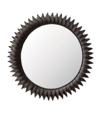 A beautiful example of the classic sun mirror, this elegant Regina Andrew design features dark zinc rays fanning out around your reflection. A beautiful example of the classic sun mirror, this elegant Regina Andrew design features dark zinc rays fanning out around your reflection.