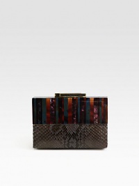 A modern vintage design in exotic python and unique pen shell from a family owned brand inspired by the Art Deco era.Top clasp closureFully lined6¼W X 4¼H X 1¾DImported A modern vintage design in exotic python and unique pen shell from a family owned brand inspired by the Art Deco era.Top clasp closureFully lined6¼W X 4¼H X 1¾DImported