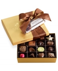 Enticingly wrapped with a satin chocolate bow, this limited-edition collection of classic chocolates from Godiva is made even more delectable when topped with a complimentary dark chocolate souffle dessert truffle bar! Enticingly wrapped with a satin chocolate bow, this limited-edition collection of classic chocolates from Godiva is made even more delectable when topped with a complimentary dark chocolate souffle dessert truffle bar!