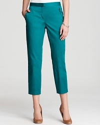 Trade your skinny jeans for something unexpected with these vibrant DKNYC pants, finished with on-trend zip pockets for modern panache. Trade your skinny jeans for something unexpected with these vibrant DKNYC pants, finished with on-trend zip pockets for modern panache.