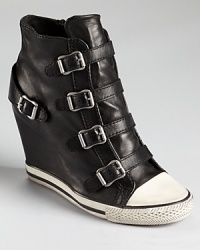 With pre-distressed details, the United Buckled sneaker wedges are made for kicking around in style. From Ash. With pre-distressed details, the United Buckled sneaker wedges are made for kicking around in style. From Ash.