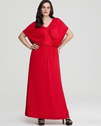 This Melissa Masse dress defines divine draping in a fluid maxi silhouette with a chic, defined waistband. This Melissa Masse dress defines divine draping in a fluid maxi silhouette with a chic, defined waistband.