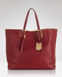 Designed with a timeless shape and sleek hardware, Longchamp's luxurious tote defines effortless day-right style. Designed with a timeless shape and sleek hardware, Longchamp's luxurious tote defines effortless day-right style.