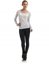 THE LOOKScoop neckline with front and back cutoutsLightweight, semi-sheer knitLong sleevesPullover styleTHE FITAbout 23 from shoulder to hemTHE MATERIALMicro TencelCARE & ORIGINMachine washMade in USAModel shown is 5'8 (172½cm) wearing US size Small. THE LOOKScoop neckline with front and back cutoutsLightweight, semi-sheer knitLong sleevesPullover styleTHE FITAbout 23 from shoulder to hemTHE MATERIALMicro TencelCARE & ORIGINMachine washMade in USAModel shown is 5'8 (172½cm) wearing US size Small.