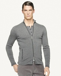 Luxuriously crafted in the finest Italian merino wool, a sleek full-zip sweater is tailored in a trim, contemporary silhouette for masculine polish. Luxuriously crafted in the finest Italian merino wool, a sleek full-zip sweater is tailored in a trim, contemporary silhouette for masculine polish.