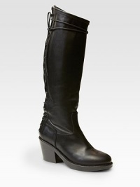 A sexy lace-up back amplifies this tall design of supple Italian leather with a powerful heel. Stacked heel, 4 (100mm)Shaft, 4¾Leg circumference, 9Leather upperBack zipLeather lining and solePadded insoleMade in Italy A sexy lace-up back amplifies this tall design of supple Italian leather with a powerful heel. Stacked heel, 4 (100mm)Shaft, 4¾Leg circumference, 9Leather upperBack zipLeather lining and solePadded insoleMade in Italy