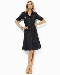 Cut in a perennially chic shirt dress silhouette from crisp, lightweight linen, the Lovell is finished with luxe gold-toned hardware and roll-tab sleeves for versatile style. Cut in a perennially chic shirt dress silhouette from crisp, lightweight linen, the Lovell is finished with luxe gold-toned hardware and roll-tab sleeves for versatile style.