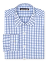 A gingham check pattern adds a breath of fresh air to your attire and easily transitions from the desk to the dinner table. A gingham check pattern adds a breath of fresh air to your attire and easily transitions from the desk to the dinner table.