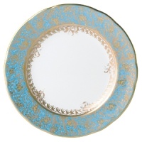 Inspired by the flamboyant designs of the 19th century, Eden Turquoise is both refined and sophisticated. This Limoges porcelain dinnerware service is a remarkable reproduction that captures the beauty of engraved gold work. Made in Limoges, France.