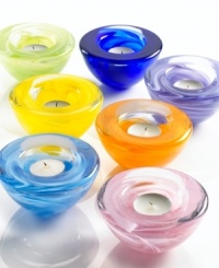 Gorgeous art glass votive holders to light up your holiday. These Anna Ehrner designed pieces from Kosta Boda come in beautiful seasonal colors and make a wonderful gifts. Measures 4 3/8. Gorgeous art glass votive holders to light up your holiday. These Anna Ehrner designed pieces from Kosta Boda come in beautiful seasonal colors and make a wonderful gifts. Measures 4 3/8.