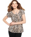 A sultry animal print picks up the pretty pleats in Style&co.'s effortlessly elegant top. The fashionably low price tag makes this a must-have!