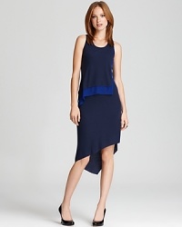 Asymmetrical, streamlined and slinky, this BCBGMAXAZRIA dress has all the makings of youthful, modern elegance. Asymmetrical, streamlined and slinky, this BCBGMAXAZRIA dress has all the makings of youthful, modern elegance.