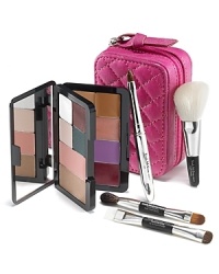 This must-have mini makeup kit is filled with the mistake-proof colors and tools you need for emergency touch-ups on-the-go. Six of Trish's iconic performance-driven brushes accompany a perfectly coordinated double-decker palette of multi-textured eye, face and lip colors, plus two shades of concealer for customized coverage on the spot. Little Black Card Glamorous Beauty includes: - Eye Shadows in Shell, Glamorous, Radiance White and Emerald- Bronzer in Golden- Blush in Perfect 1- Lip Color in Sparkling Plum- Lip Glosses in Serene and Sexy- Brightening Line Minimizing Concealers in Medium and Honey- Angled Contour Precise Eye Lining Brush- Va Va Voom Tapered Blending Brush- Petite Cream Blender Lip Brush