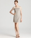 In sparkling lace, Ali Ro's sophisticated short sleeve dress lends a classic look in a neutral hue.
