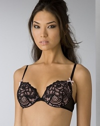 A padded bra with rose lace detail and bow detail at adjustable straps. Hook and eye closure. Style #723607 A padded bra with rose lace detail and bow detail at adjustable straps. Hook and eye closure. Style #723607