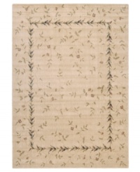 A beautiful lattice of delicate vines and blooming flowers gives this rug its magnetic charm. On a light beige ground with soft accents of red and blue, this densely woven piece invites you into wonderful interior decor. A beautiful lattice of delicate vines and blooming flowers gives this rug its magnetic charm. On a light beige ground with soft accents of red and blue, this densely woven piece invites you into wonderful interior decor.