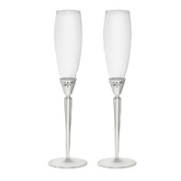 Monique Lhuillier for Royal Doulton Modern Love Metal Gifts feature modern shapes with intricate details. The collection of silver plated gifts are treated with a lacquer coating to eliminate fingerprinting and scratches and includes popular wedding gifts like frames, toasting flutes and a cake knife and server. Monique Lhuillier for Royal Doulton Modern Love Metal Gifts feature modern shapes with intricate details. The collection of silver plated gifts are treated with a lacquer coating to eliminate fingerprinting and scratches and includes popular wedding gifts like frames, toasting flutes and a cake knife and server.
