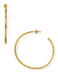 18-karat gold hoops from Gorgana are a jewel box staple. This pair boasts edgy, textured detailing to take you downtown in the most elegant way.