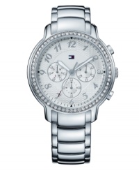Smooth steel and etched patterns play off one another in this design by Tommy Hilfiger. Watch features stainless steel bracelet and round case. Bezel embellished with Swarovski elements. Etched silvertone dial features numerals, luminous hands, logo and three subdials. Quartz movement. Water resistant to 50 meters. Ten-year limited warranty. Smooth steel and etched patterns play off one another in this design by Tommy Hilfiger. Watch features stainless steel bracelet and round case. Bezel embellished with Swarovski elements. Etched silvertone dial features numerals, luminous hands, logo and three subdials. Quartz movement. Water resistant to 50 meters. Ten-year limited warranty.