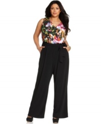 Land an on-trend look with NY Collection's sleeveless plus size jumpsuit, showcasing a printed top and belted waist. Land an on-trend look with NY Collection's sleeveless plus size jumpsuit, showcasing a printed top and belted waist.