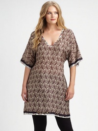 Wonderfully woven silk meets an allover print with contrast details. Its elbow-length sleeves will provide you with arm coverage as the self-tie waist defines your shape.V-neckElbow-length sleevesSelf-tie belt at backAllover printContrast-print trimAbout 39 from shoulder to hemSilkHand washImported Wonderfully woven silk meets an allover print with contrast details. Its elbow-length sleeves will provide you with arm coverage as the self-tie waist defines your shape.V-neckElbow-length sleevesSelf-tie belt at backAllover printContrast-print trimAbout 39 from shoulder to hemSilkHand washImported