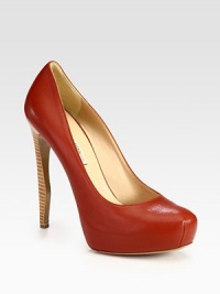 Ultra-high stacked heel adds a sultry touch to this traditional leather style. Stacked heel, 5 (125mm)Covered platform, 1 (25mm)Compares to a 4 heel (100mm)Leather upperLeather lining and solePadded insoleMade in Italy Ultra-high stacked heel adds a sultry touch to this traditional leather style. Stacked heel, 5 (125mm)Covered platform, 1 (25mm)Compares to a 4 heel (100mm)Leather upperLeather lining and solePadded insoleMade in Italy