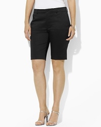 Designed for a flattering, slimming fit from lustrous stretch cotton sateen, the chic Huldah Bermuda short is the epitome of timeless, preppy style. Designed for a flattering, slimming fit from lustrous stretch cotton sateen, the chic Huldah Bermuda short is the epitome of timeless, preppy style.
