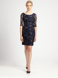 A delicate, airy lace overlay lends a feminine air to this floral silhouette.Jewel necklineSheer elbow-length sleevesConcealed back zipAbout 23 from natural waistCottonDry cleanImportedModel shown is 5'10 (177cm) wearing US size 4. A delicate, airy lace overlay lends a feminine air to this floral silhouette.Jewel necklineSheer elbow-length sleevesConcealed back zipAbout 23 from natural waistCottonDry cleanImportedModel shown is 5'10 (177cm) wearing US size 4.