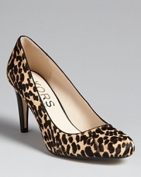 Spot on with the exotics trend, these KORS Michael Kors pumps are an elegant take on the look, in a subdued print on luxe calf hair. Spot on with the exotics trend, these KORS Michael Kors pumps are an elegant take on the look, in a subdued print on luxe calf hair.