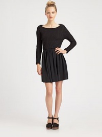 Ribbed sweaterdress revived by a flared, smooth skirt. BoatneckLong sleevesElastic waistbandAbout 18 from natural waist80% cotton/20% nylonDry cleanMade in USA of Italian fabricModel shown is 5'10 (177cm) wearing US size Small. Ribbed sweaterdress revived by a flared, smooth skirt. BoatneckLong sleevesElastic waistbandAbout 18 from natural waist80% cotton/20% nylonDry cleanMade in USA of Italian fabricModel shown is 5'10 (177cm) wearing US size Small.