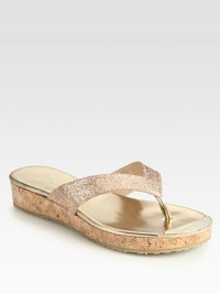 This cork wedge essential is dressed up with light-catching glitter and a signature logo plate. Glitter-coated leather upper with metallic leather trimLeather liningRubber solePadded insoleMade in Spain This cork wedge essential is dressed up with light-catching glitter and a signature logo plate. Glitter-coated leather upper with metallic leather trimLeather liningRubber solePadded insoleMade in Spain