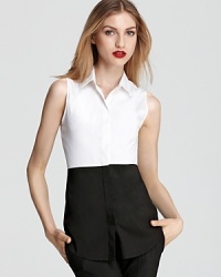Theory puts a fresh spin on the classic button-up with this graphic color-block top, tailored in a trend-prefect sleeveless silhouette. Theory puts a fresh spin on the classic button-up with this graphic color-block top, tailored in a trend-prefect sleeveless silhouette.