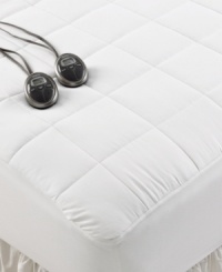 Find the personalized comfort you've been looking for in this Premium Heated mattress pad from SlumberRest, featuring twenty heat settings that allow you to find your perfect temperature for a better night's rest. Also features plush quilted construction for an extra layer of comfort on your mattress. Find the personalized comfort you've been looking for in this Premium Heated mattress pad from SlumberRest, featuring twenty heat settings that allow you to find your perfect temperature for a better night's rest. Also features plush quilted construction for an extra layer of comfort on your mattress.