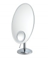 Focus up. Featuring an elegant oval shape and 10x magnifying inset, this vanity makeup mirror offers two views in one sophisticated design. Adjustable.