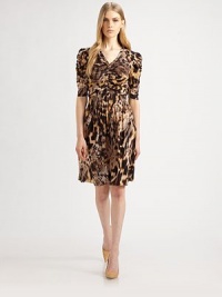 Supple silk, patterned with an exotic leopard print and finished with smocked, ruched detailing.V necklinePuffed elbow-length sleevesRuched front seamSmocked waistbandAbout 24 from natural waistSilkDry cleanImportedModel shown is 5'11 (180cm) wearing US size 4. Supple silk, patterned with an exotic leopard print and finished with smocked, ruched detailing.V necklinePuffed elbow-length sleevesRuched front seamSmocked waistbandAbout 24 from natural waistSilkDry cleanImportedModel shown is 5'11 (180cm) wearing US size 4.