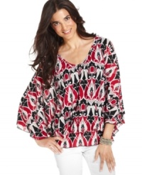 Go with the flow: Style&co.'s draped peplum tunic gives any outfit an elegant upgrade. Go with the flow: Style&co.'s draped peplum tunic gives any outfit an elegant upgrade.