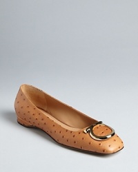 In a luxe ostrich embossed leather with distinctive logo accents, these flats are exotically Salvatore Ferragamo. In a luxe ostrich embossed leather with distinctive logo accents, these flats are exotically Salvatore Ferragamo.