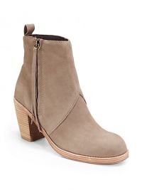 THE LOOKWestern-inspired nubuck upperSide zipper with fringe pullBack tabContrast stitching around the outsolePadded insoleStacked heel, 3½ (90mm)THE MATERIALNubuck upperFabric liningLeather soleORIGINImported THE LOOKWestern-inspired nubuck upperSide zipper with fringe pullBack tabContrast stitching around the outsolePadded insoleStacked heel, 3½ (90mm)THE MATERIALNubuck upperFabric liningLeather soleORIGINImported