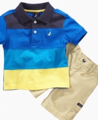Out to sea. He'll look like he's ready to take the helm in this dashing polo shirt and short set from Nautica. Out to sea. He'll look like he's ready to take the helm in this dashing polo shirt and short set from Nautica.