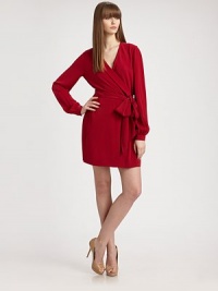 Plunging v-neck, self-tie waist and slash pockets enliven this lightweight, wrap-front design. Crossover v-neckLong bishop sleevesSelf tie at the waistAbout 18 from natural waistSilkDry cleanImportedModel shown is 5'10 (177cm) wearing US size 2. Plunging v-neck, self-tie waist and slash pockets enliven this lightweight, wrap-front design. Crossover v-neckLong bishop sleevesSelf tie at the waistAbout 18 from natural waistSilkDry cleanImportedModel shown is 5'10 (177cm) wearing US size 2.