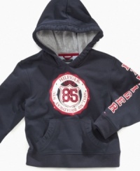 He can pull on a warm style in a moment thanks to this cozy Tommy Hilfiger graphic hoodie. He can pull on a warm style in a moment thanks to this cozy Tommy Hilfiger graphic hoodie.
