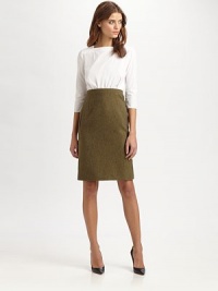 Cotton boatneck pairs with a high-waisted wool tweed skirt for a look that smoothly transitions from work hours to after hours. BoatneckThree-quarter sleevesAttached wool skirtSlash pocketsInvisible back zipperAbout 23 from natural waistBody: WoolContrast: CottonDry cleanImportedModel shown is 5'10 (177cm) wearing US size 4. Cotton boatneck pairs with a high-waisted wool tweed skirt for a look that smoothly transitions from work hours to after hours. BoatneckThree-quarter sleevesAttached wool skirtSlash pocketsInvisible back zipperAbout 23 from natural waistBody: WoolContrast: CottonDry cleanImportedModel shown is 5'10 (177cm) wearing US size 4.